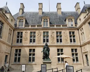 IMG_20210821_130001 Main courtyard of hotel Carnavalet, with a statue of Louis XIV by Antoine Coysevox, 1689. The renaissance hotel was remodeled by Mansart in 1660. Roofs were...