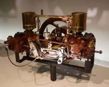 IMG_1591 1.5 HP Daimler two-cylinder engine In 1889, Daimler and Maybach built a first two-cylinder gasoiine engine to be able to boost output. It was based on the...