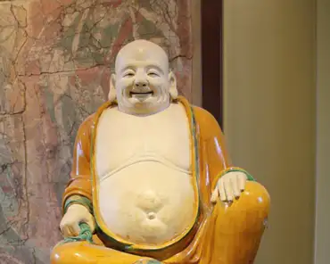 IMG_6381 Stoneware figure of Budai, Henan province, Ming dynasty, dated 1486. Budai, the fat smiling monk, is an accretion of several legends. He is sometimes regarded...
