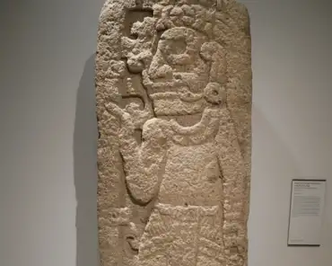 P1070434 Panel with a figure holding a staff and a bag, Mexico, Veracruz, volcanic stone, 500-700 AD.
